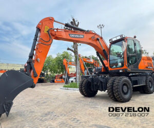 Máy xúc đào bánh lốp Develon DX140WE