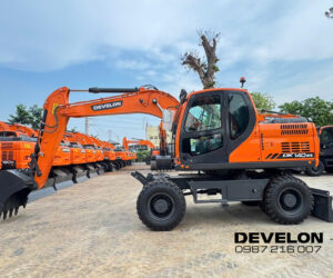 Máy xúc đào bánh lốp Develon DX140WE